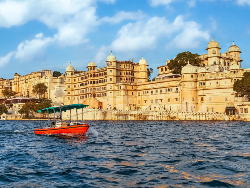 City Palace Udaipur as seen from a boat on Lake Pichola.